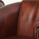 Set of 2 sheepskin club armchairs in a dark cognac colour