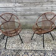 Paire de fauteuils en rotin, pieds métal CIRCA 1950