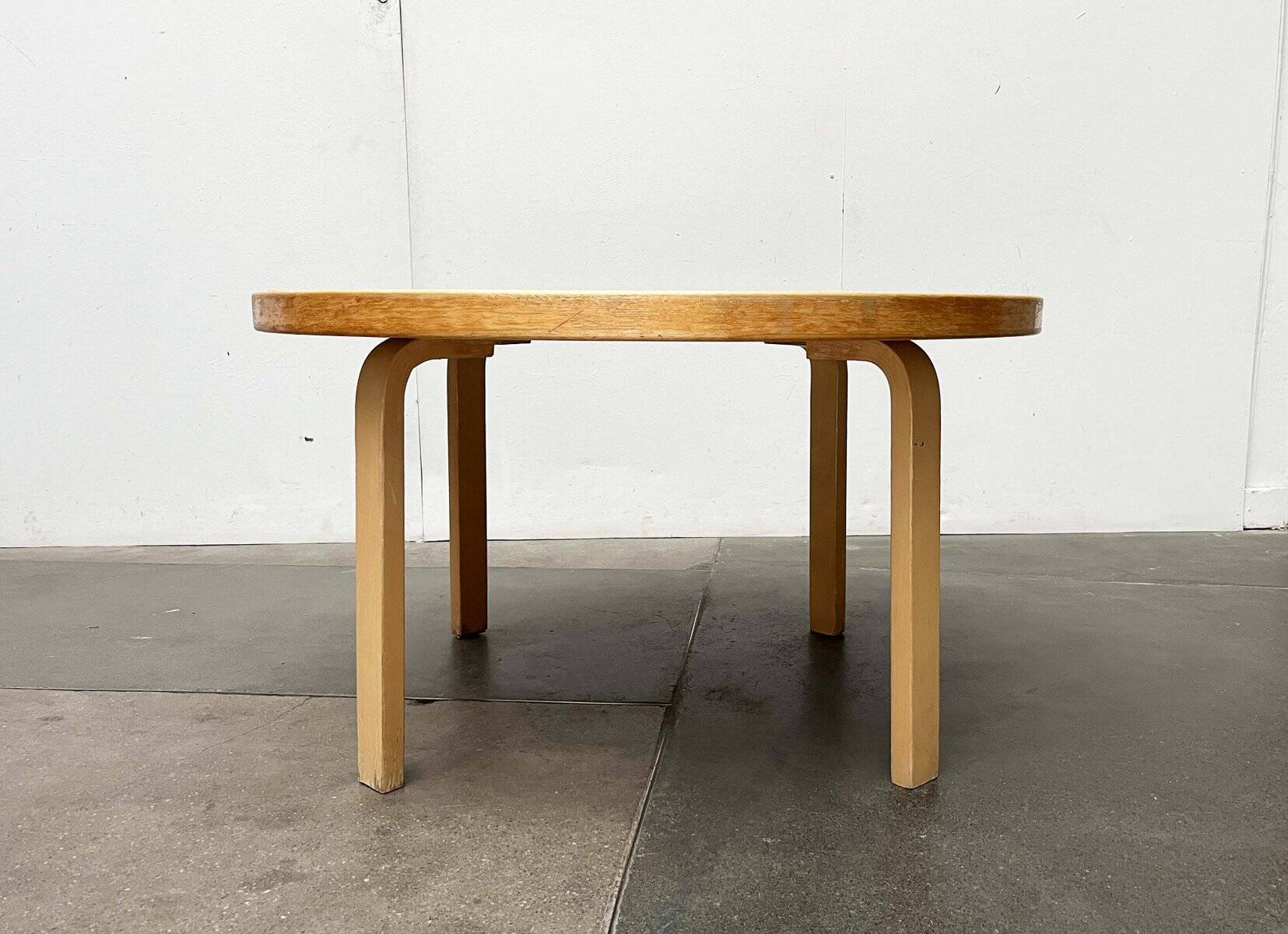 Mid-century modern yellow linoleum coffee table by Alva Aalto for Artek, Finland, 1960s.