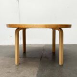 Mid-century modern yellow linoleum coffee table by Alva Aalto for Artek, Finland, 1960s.