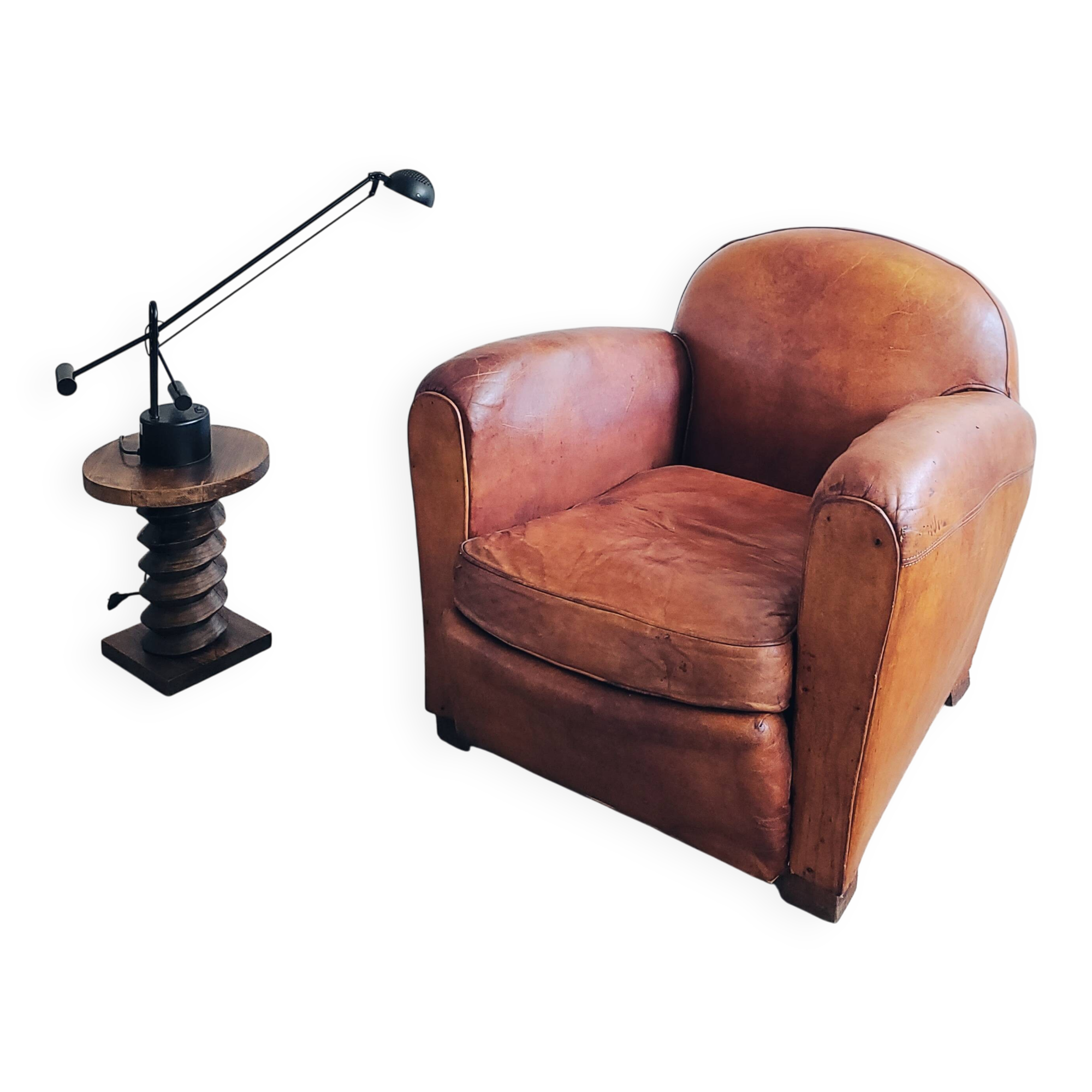 Fauteuil club en cuir patiné