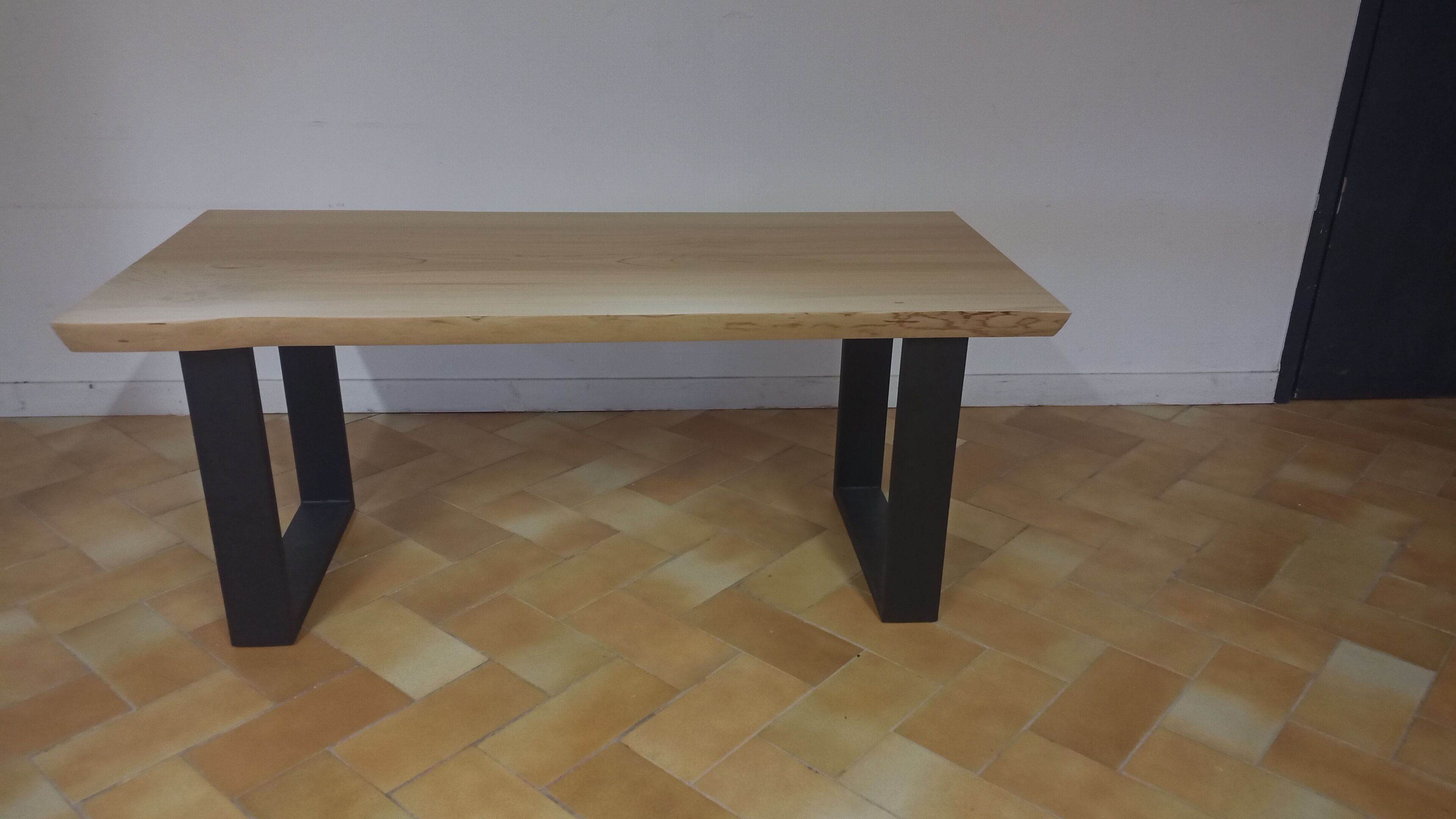 Design coffee table in natural wood