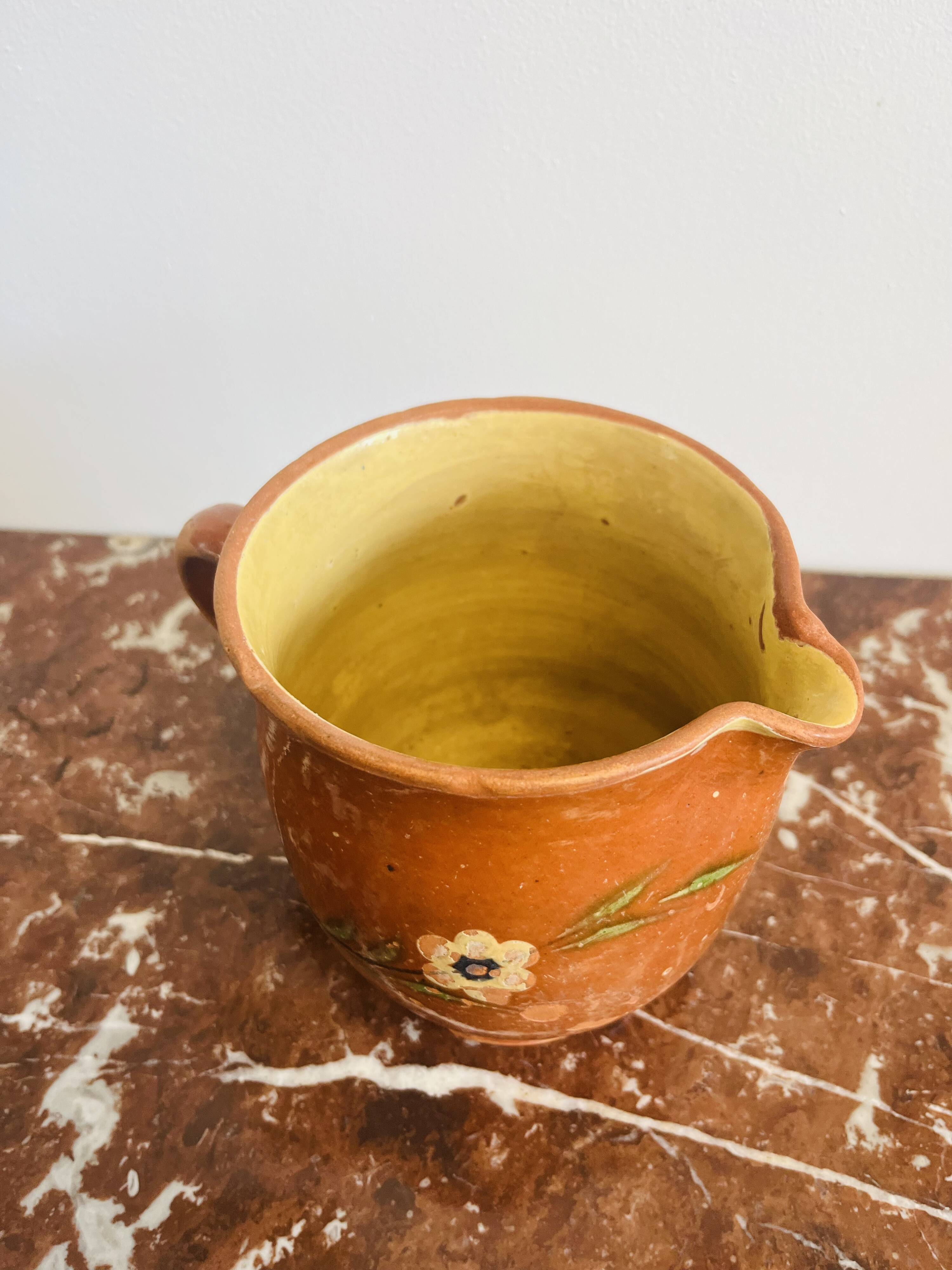Ancienne poterie pichet savoyard à décor floral