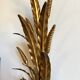 Golden metal wheat ear applicator, 1950s