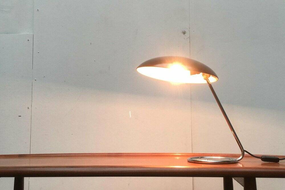Metal table lamp model 6761 from the mid-century German period by Christian Dell for Kaiser Leuchten, 1960s.