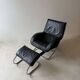 Swiss lounge chair with ottoman by Robert Haussmann from the 1980s.