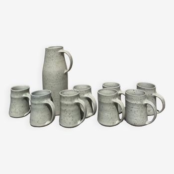 Set in stoneware cups and pitcher