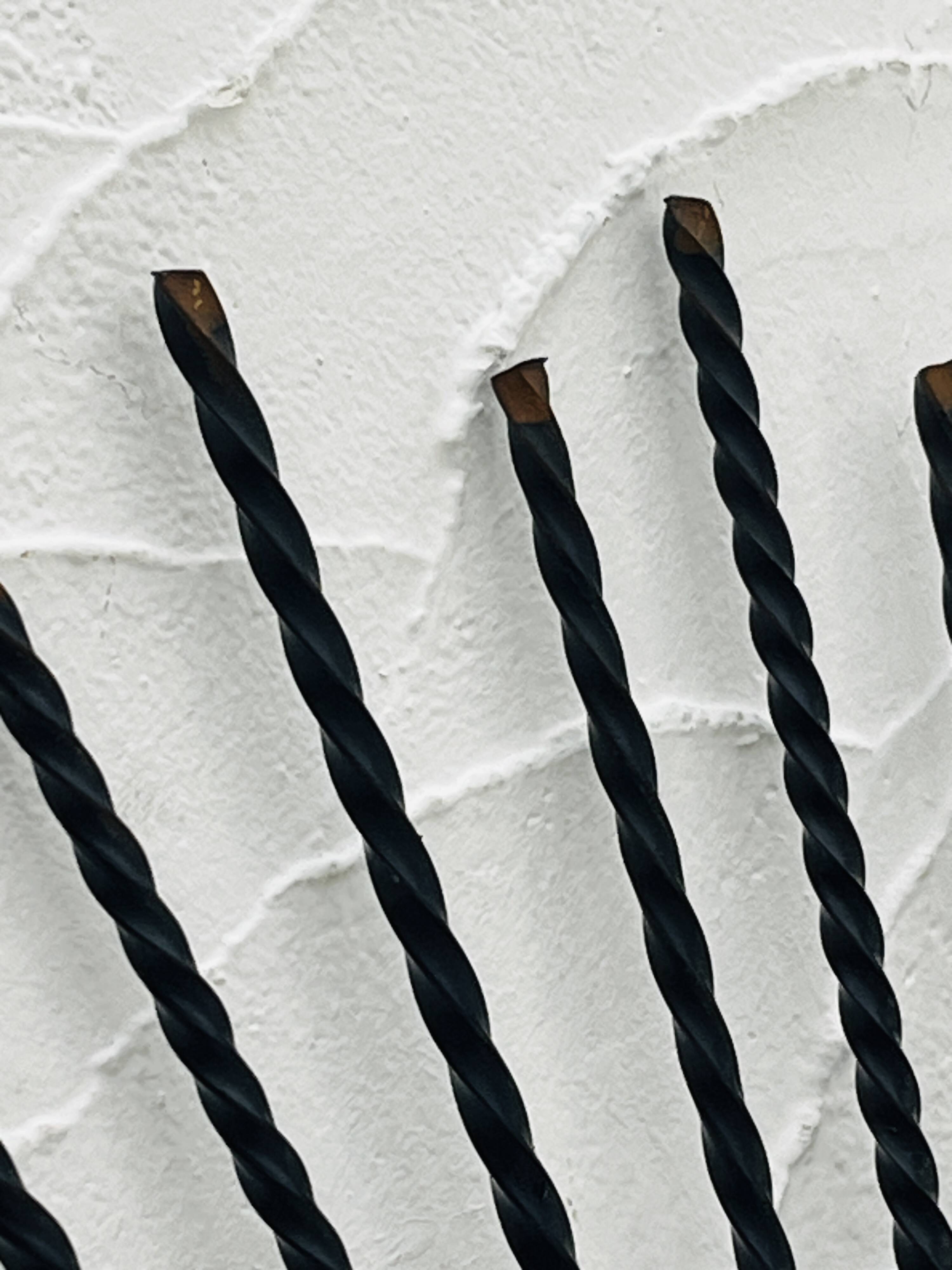 Vintage black and gold metal sun mirror from the 1960s.