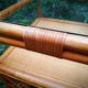 Glass and rattan table