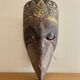Grand traditional Indonesian mask carved from wood.