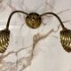 Articulated shell wall light
