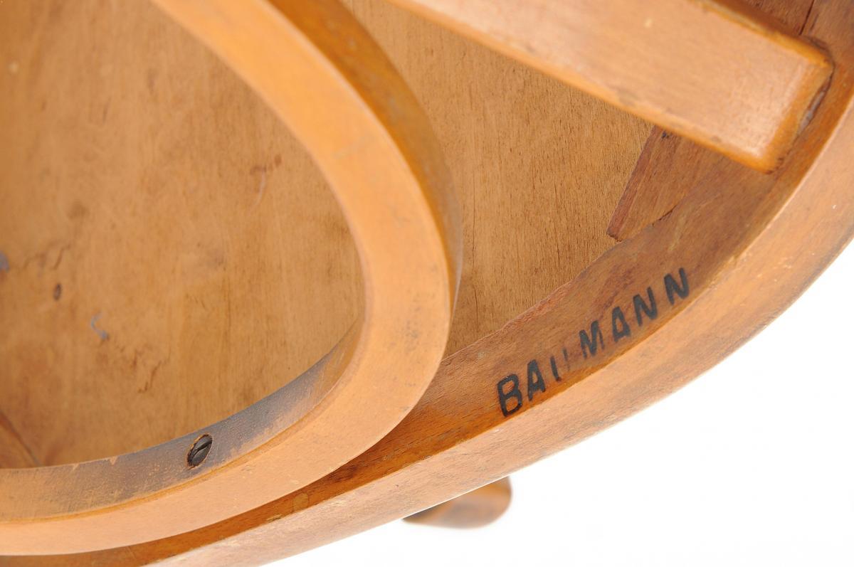 La Manufacture Baumann curved wooden office armchair