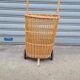 Vintage wicker log basket on vintage wheels