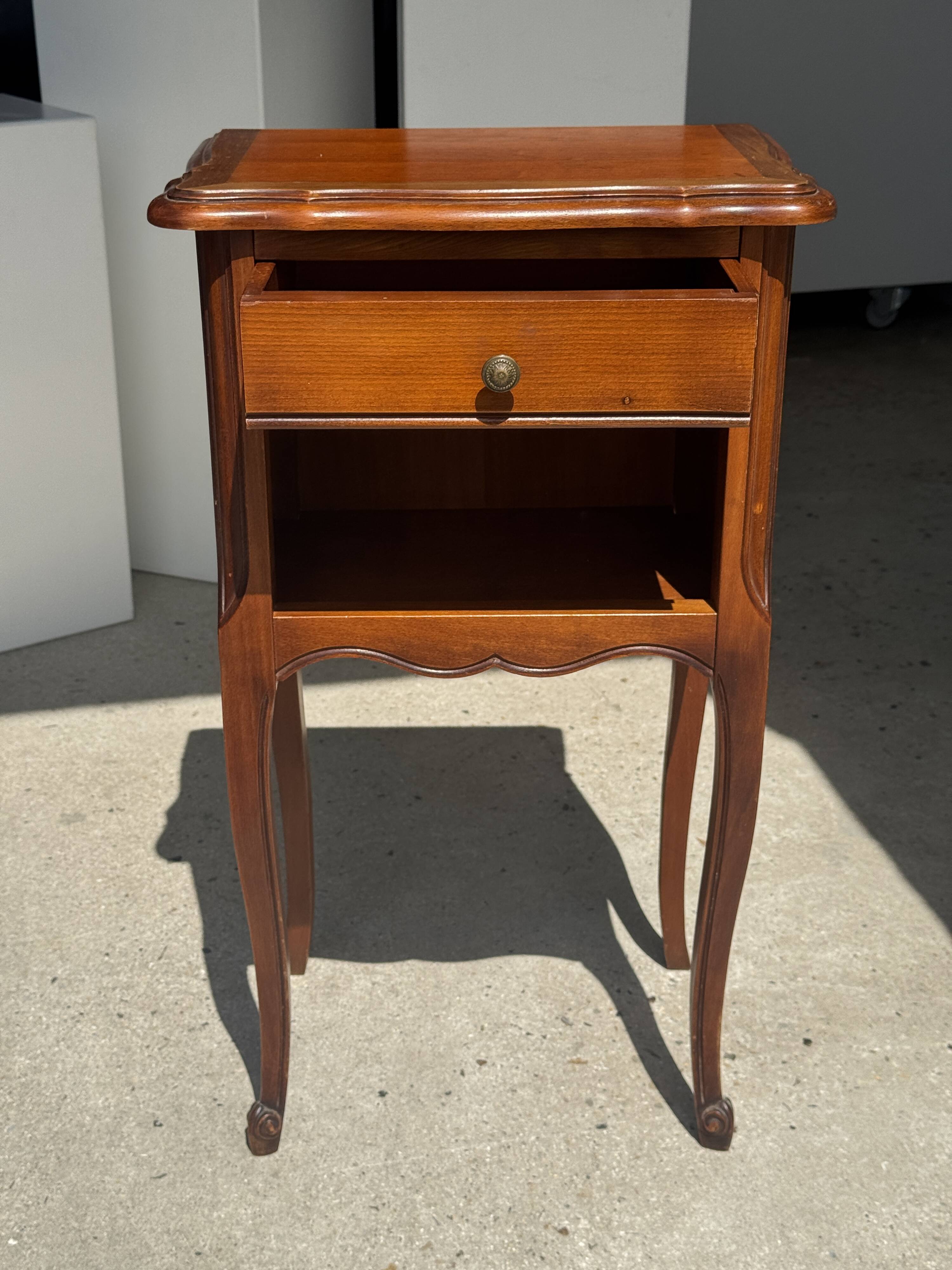 Classic wooden bedside table with drawer