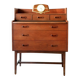 Mid-century teak dressing table in curved brown with sliding mirror and 6 drawers.