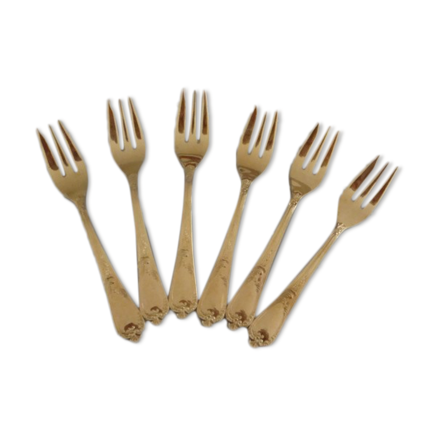 Golden metal cake forks