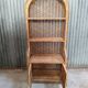 Vintage rattan wicker library in Emmanuelle style