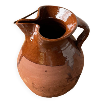 Glazed earthenware jug