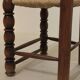 Pair of rustic chairs in turned wood with straw seats