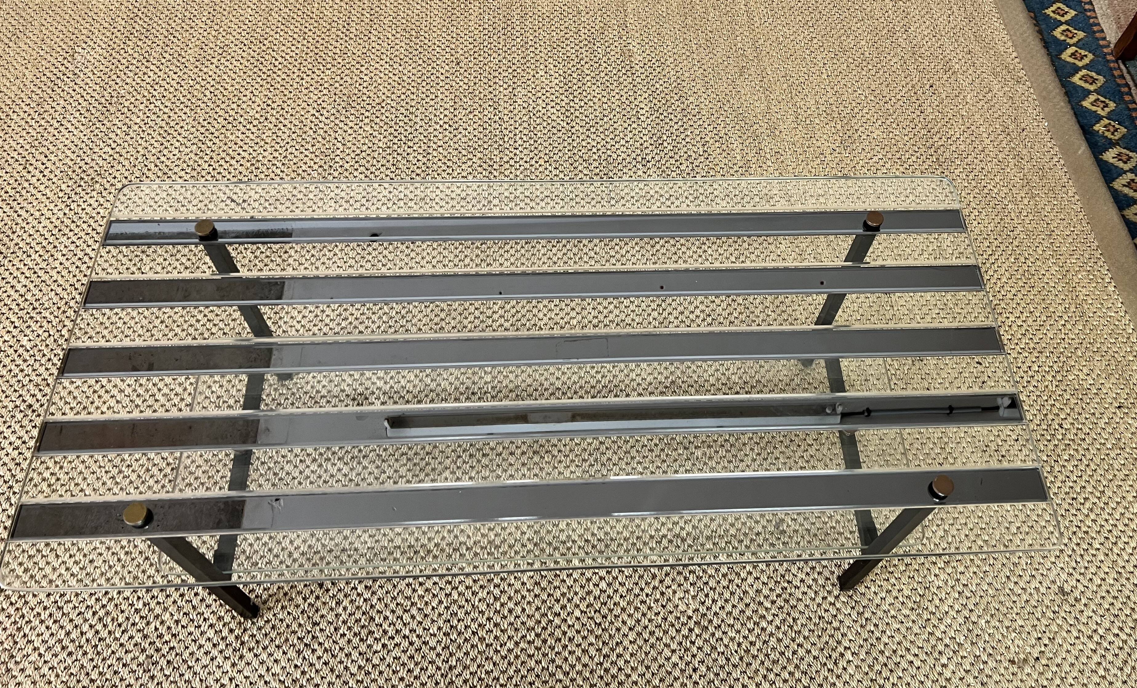 Glass and metal coffee table