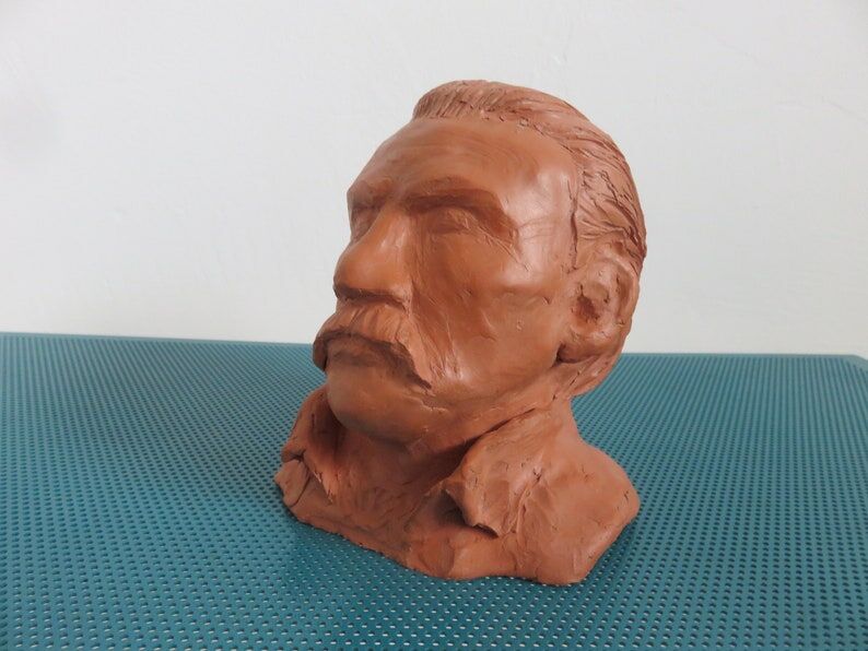 Ancient terracotta bust statue