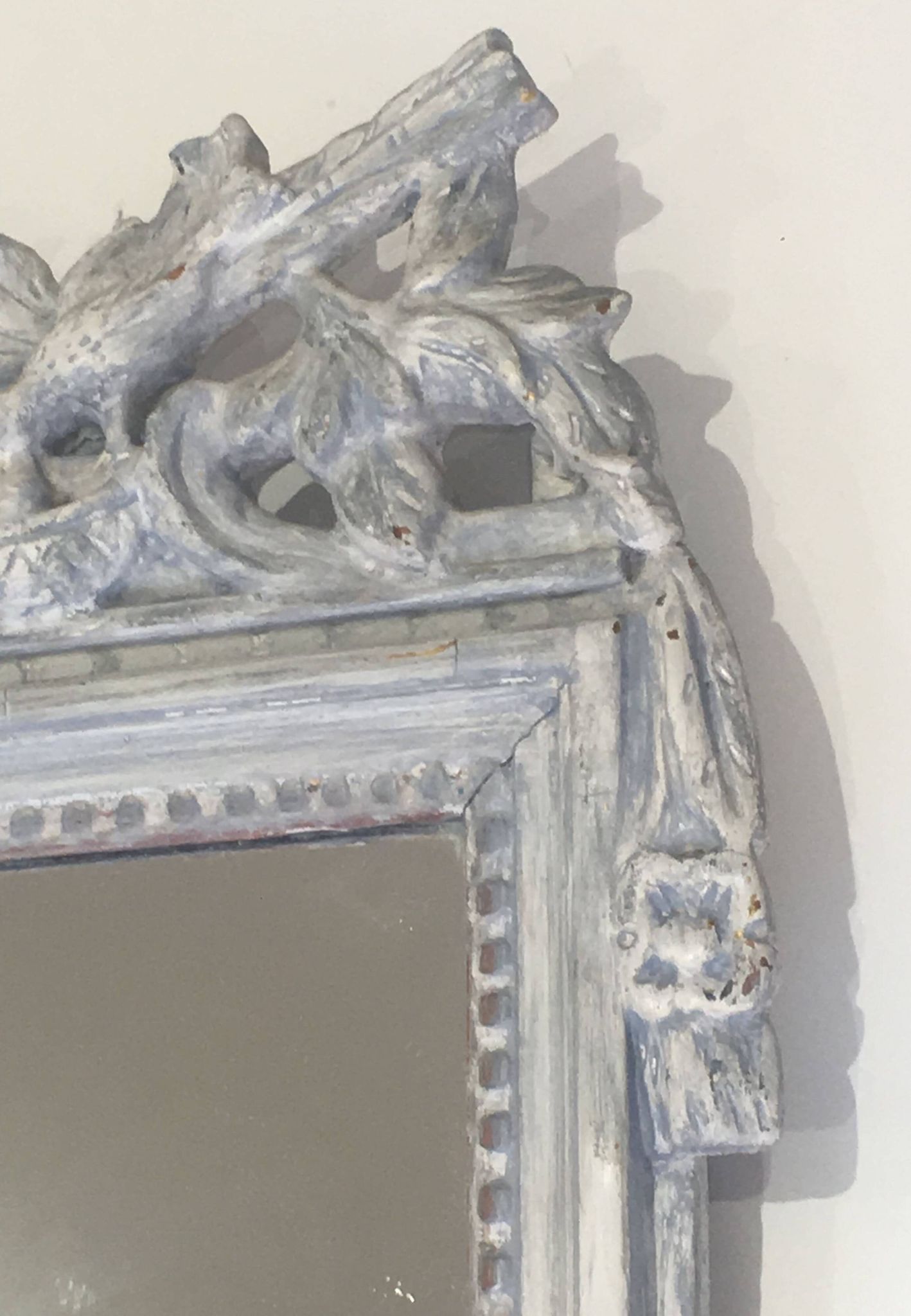 Louis XVI Style Mirror in Carved Wood with Grey Patina and Dove Pediment