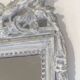 Louis XVI Style Mirror in Carved Wood with Grey Patina and Dove Pediment