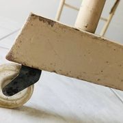 Wood and wicker cradle from the 1950s.