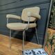 vintage tubular metal chrome office chair with patterned fabric.
