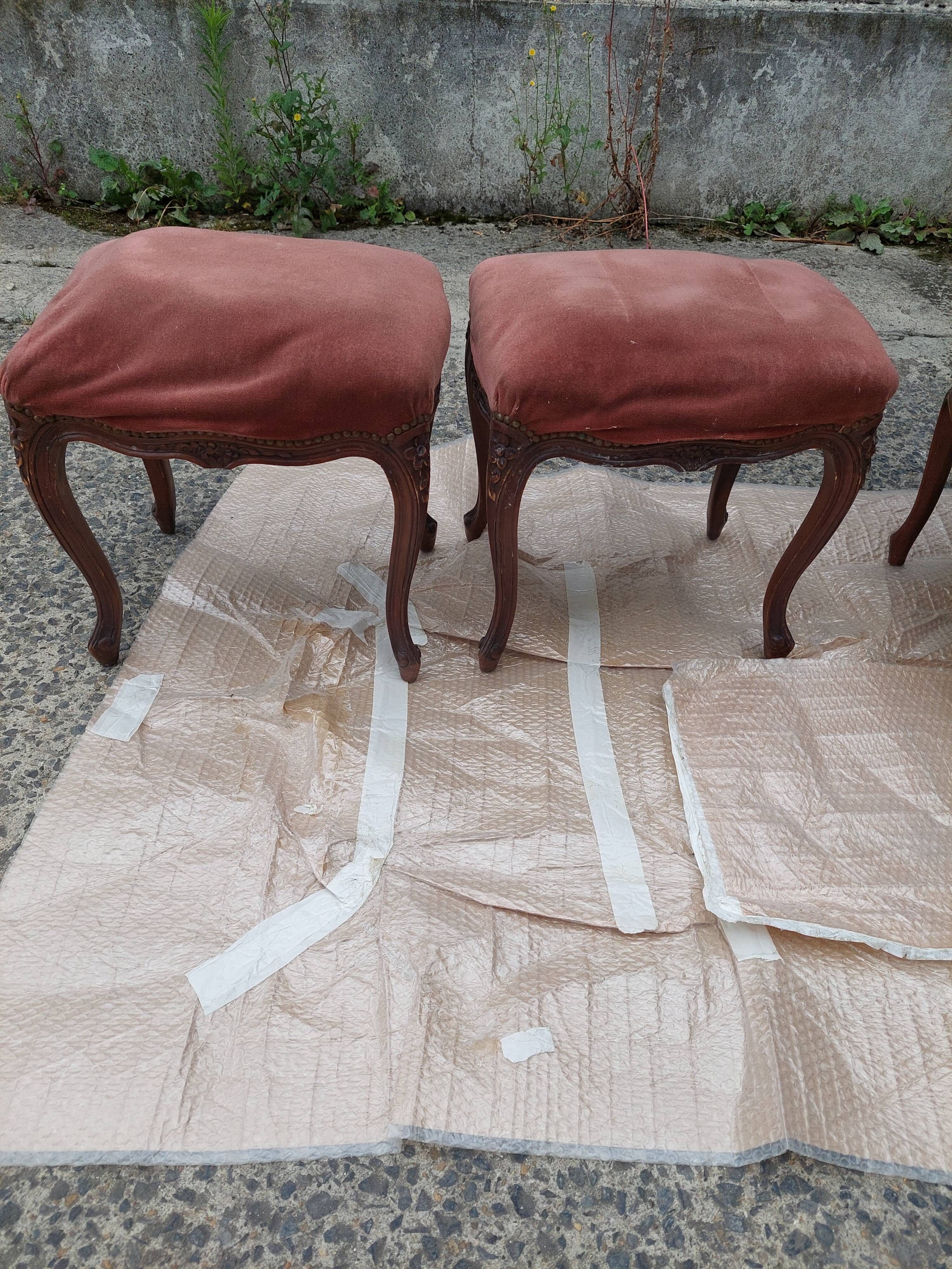 Pair of armchairs with Louis Philippe style footrests in walnut