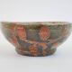 Small bowl in water green glazed ceramic with coral pink pattern