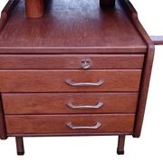 Vintage 1950s teak desk by designer Jacques Hauville.