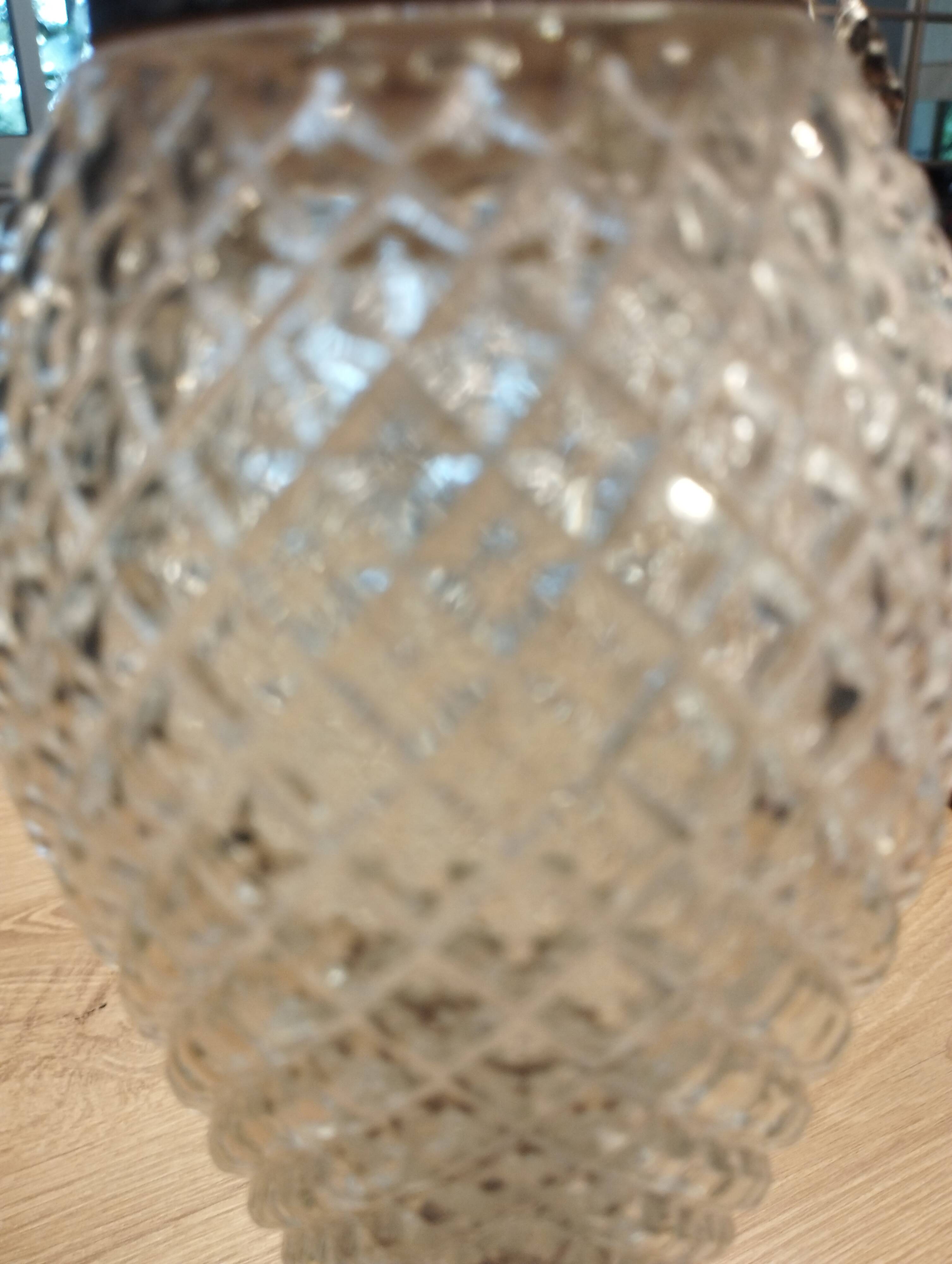 Old ewer in crystal and silver metal