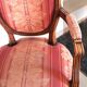 Pair of Louis XVI style cabriolet armchairs with medallion