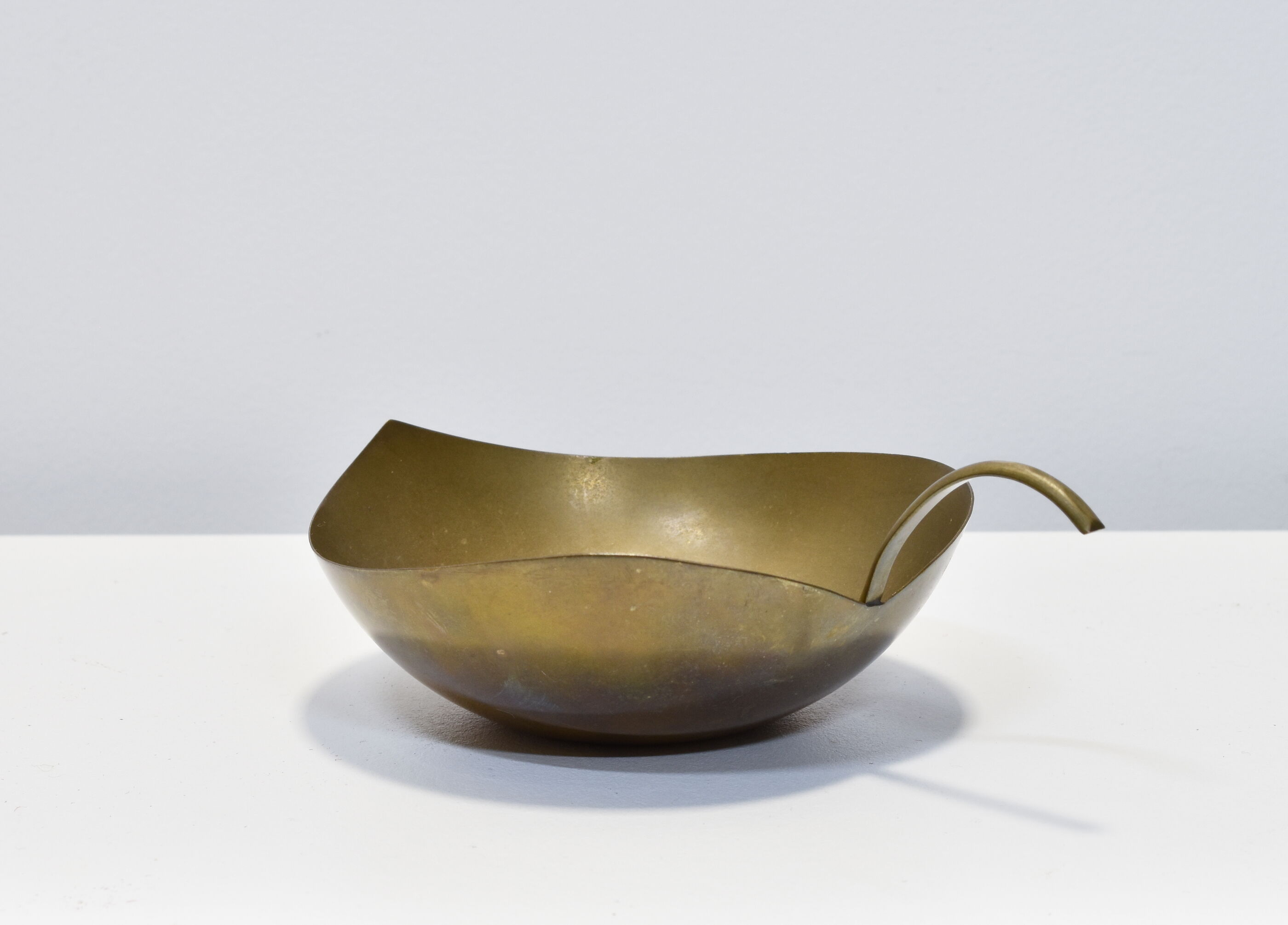 Empty brass leaf pocket