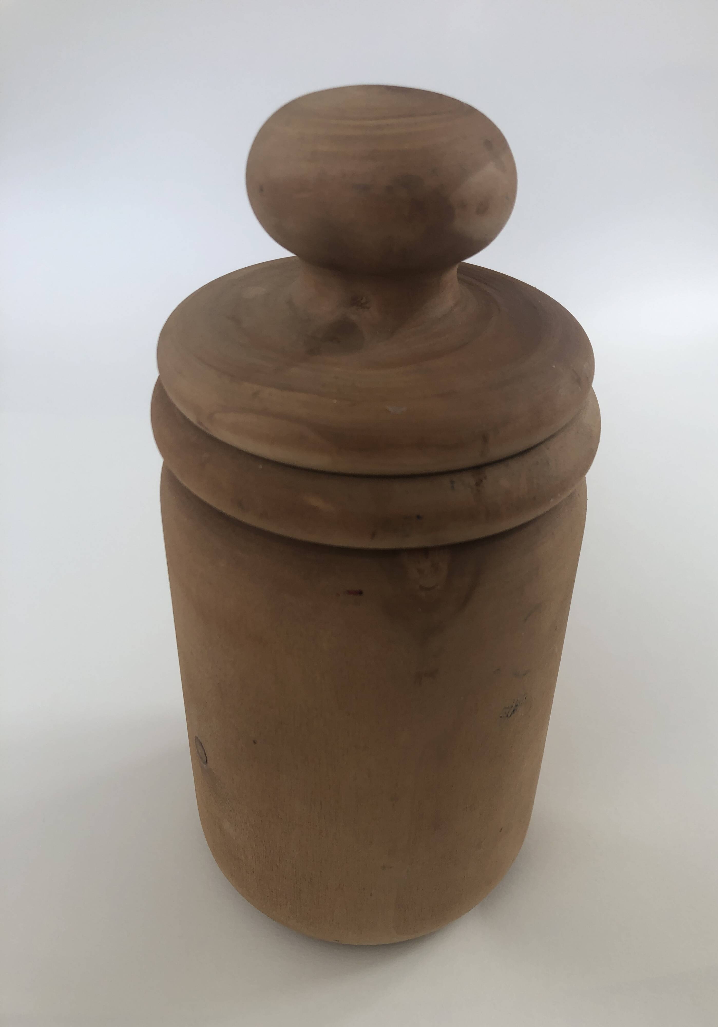 large pot with turned wooden lid