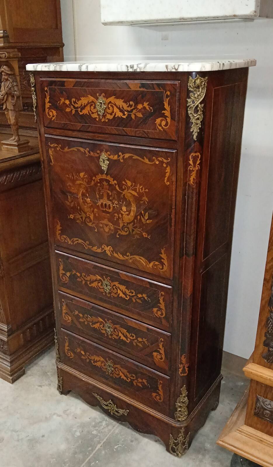 Secretary with a drop-leaf in precious marquetry wood in the Louis XV style.