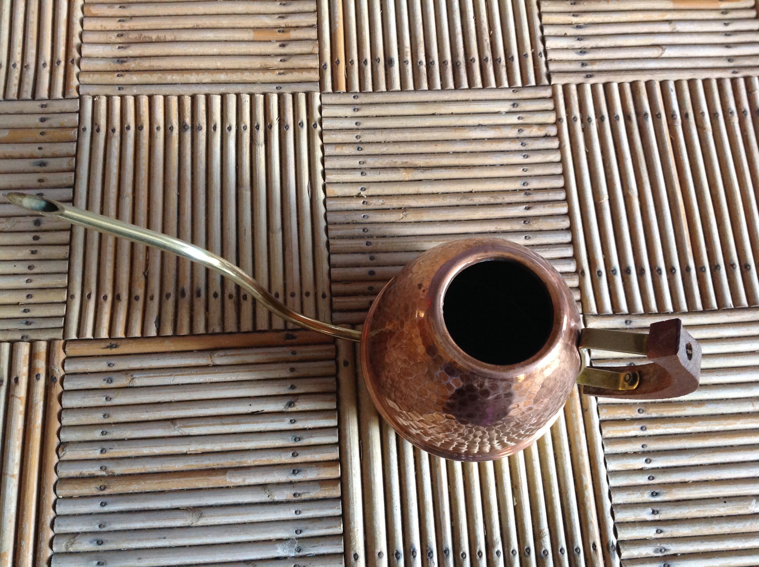 Copper and brass watering can
