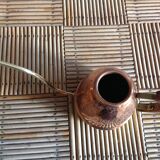 Copper and brass watering can