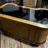 Curved Art Deco period center desk in clear magnifying glass and black lacquer circa 1925