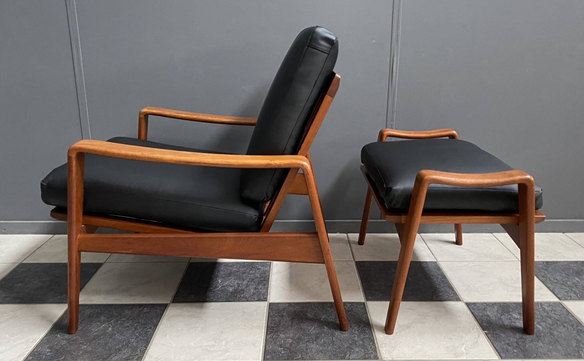 arne Wahl Iversen teak arm chair with ottoman