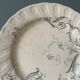 Set of 12 flat plates Terre De Fer XIXth in opaque porcelain of Gien, model Rinceaux
