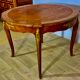 Round table style louis xv, marquetry of rosewood, possibility of extensions.
