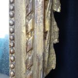 Louis XVI period mirror in gilded carved wood