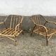 Pair of rattan armchairs and vintage oval table
