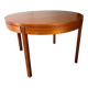 Extendable teak round table