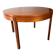 Extendable teak round table