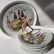 Porcelain cheese platter with 6 matching plates.