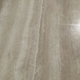 Large vintage dining table in travertine in the 1970s Carpa style.