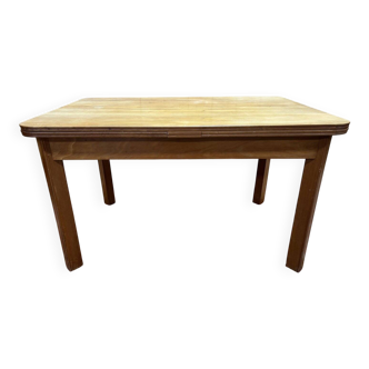 Table with extensions from the 1950s in elm.